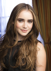 Lily Collins - "Priest" press conference portraits by Armando Gallo (Beverly Hills, May 1, 2011) - 28xHQ CSHe5ozG