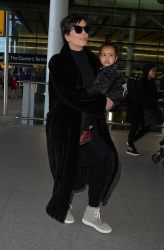 Kris Jenner - at Heathrow airport in London - March 2, 2015 (14xHQ) GqdGmkJR