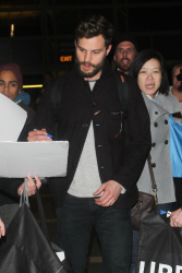 Jamie Dornan - Spotted at at LAX Airport with his wife, Amelia Warner - January 13, 2015 - 69xHQ H46BMcBz