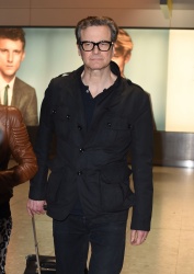 Colin Firth - is seen arriving at London’s Heathrow airport with his wife Livia (January 13, 2015) - 7xMQ ZBLrljOe